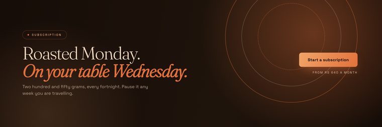 Ember and Oak subscription web banner with concentric coffee rings and a warm gradient